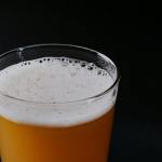 close up shot of yellow liquid on clear glass