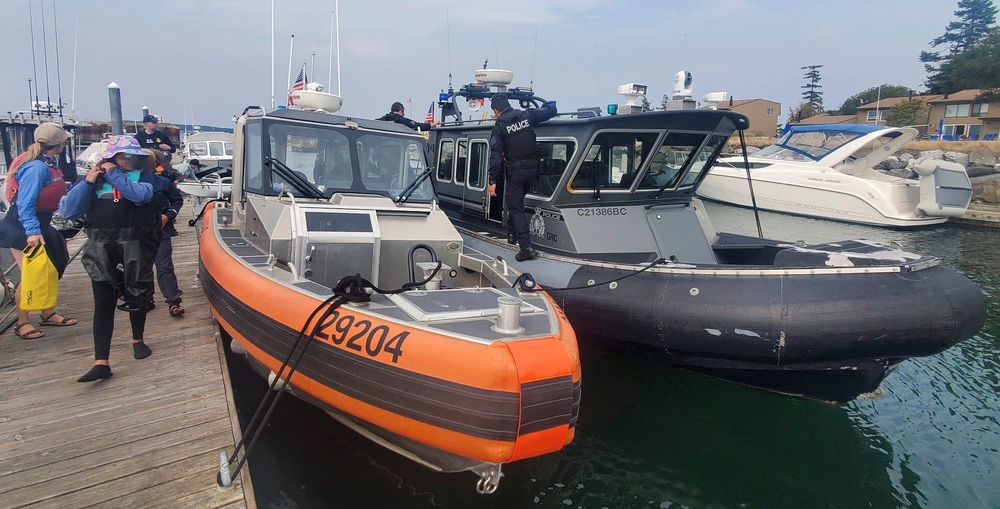 US Coast Guard, Royal Canadian Mounted Police, and Washington State Park personnel rescued 12 kayakers in distress between Patos Island and Sucia Island (August 14, 2025). Source: USCG