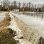 Flood waters flow over E Pole Road (SR544) (December 11, 2025). Source: WSDOT