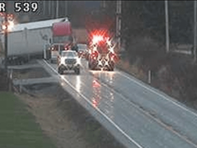 Semi-truck and trailer block all lanes on Guide Meridian in Lynden