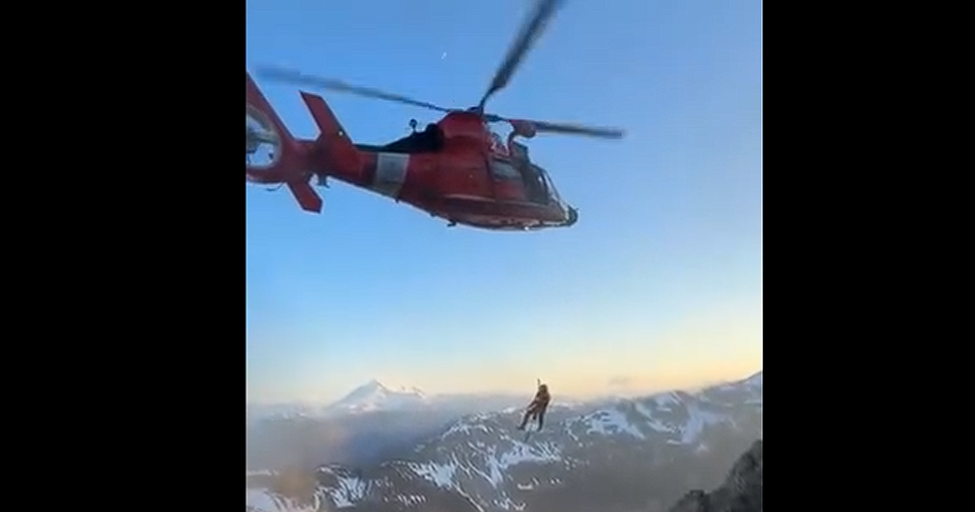 A US Coast Guard Air Station Port Angeles helicopter crew rescues a hiker from a steep gully at Mount Larrabee in Washington, June 20, 2026. The rescue was accomplished under extreme conditions at an altitude of 6,710 feet. (Video courtesy of US Coast Guard)