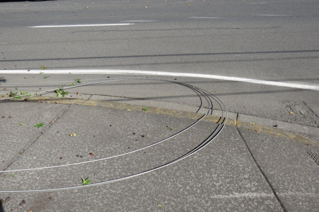 Wires down on the roadway after a power pole was knocked down in Ferndale (September 8, 2026). Photo: Whatcom News